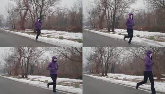 女孩在雪地里慢跑高清在线视频素材下载