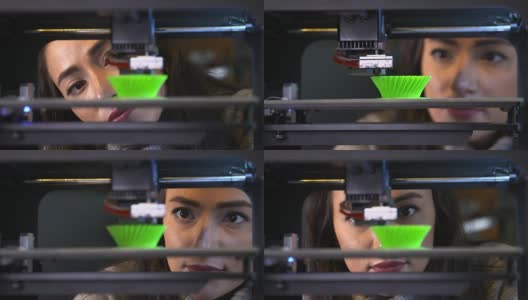 4K:年轻女子在看3D打印机高清在线视频素材下载