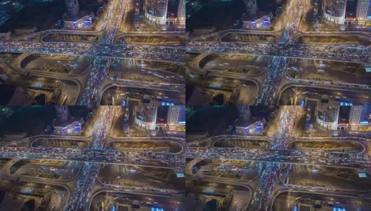 T/L WS HA PAN Crowded Road Intersection at Night /北京，中国高清在线视频素材下载