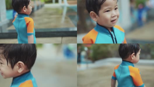 孩子，可爱的小男孩嬉戏和快乐的与家人在海洋公园高清在线视频素材下载