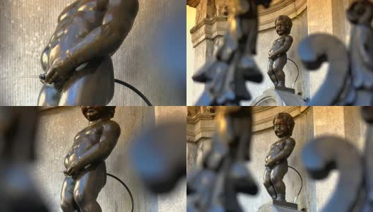 布鲁塞尔的撒尿小童雕像。比利时布鲁塞尔，一个在美丽夏日小便的男孩雕像。高清在线视频素材下载
