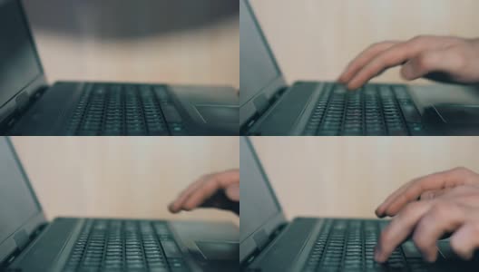 中层经理的特写打开笔记本电脑屏幕，开始在键盘上打字高清在线视频素材下载