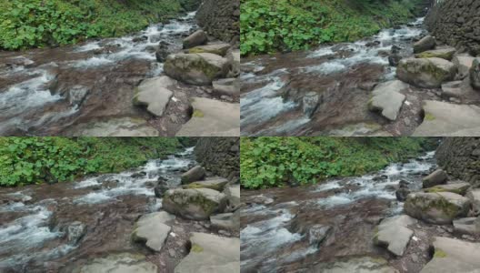 瀑布溪流在山林中奔流高清在线视频素材下载