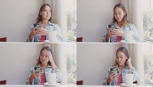 一个迷人的年轻女子坐在咖啡店里发短信的4k视频片段高清在线视频素材下载