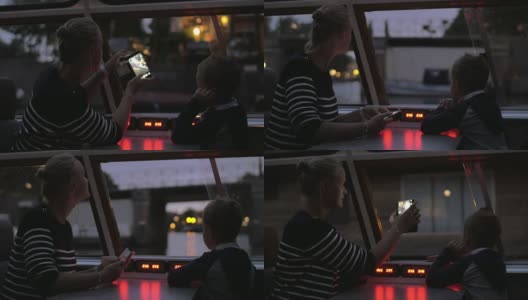 母亲和孩子有旅游的水旅行在晚上阿姆斯特丹高清在线视频素材下载