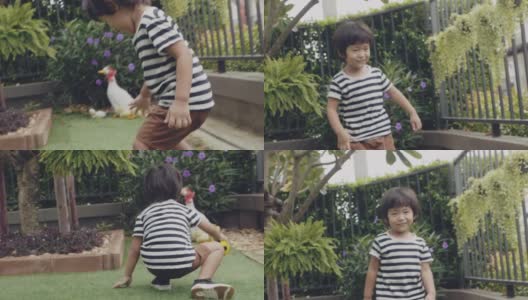 男孩把球抛起来踢，在绿色的草坪上奔跑高清在线视频素材下载
