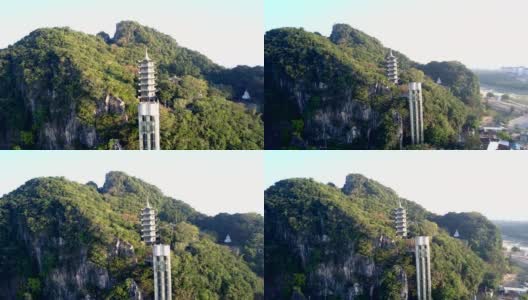 现代化的电梯在城市深处的热带雨林中的宝塔高清在线视频素材下载