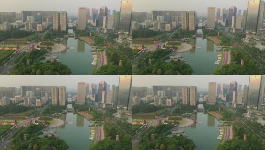 日落时分佛山市区著名的公园河广场航拍4k中国全景高清在线视频素材下载