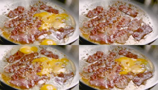 在银锅里煎咸肉和鸡蛋。准备自制的早餐。高清在线视频素材下载
