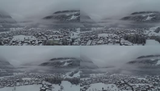 因特拉肯伯恩斯奥伯兰空中覆盖积雪的村庄高清在线视频素材下载