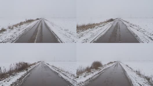 在寒冷的雪天早晨，驾车行驶在乡间的道路上，汽车行车记录仪拍下了这张照片高清在线视频素材下载