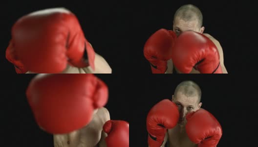 高清慢动作:拳击手对着镜头出拳高清在线视频素材下载