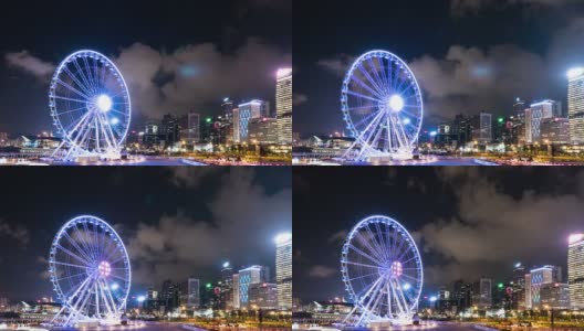天际线，发光的摩天轮和香港的现代建筑，时光流逝。高清在线视频素材下载