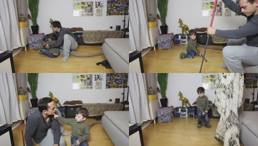 父亲和儿子在打扫房子高清在线视频素材下载
