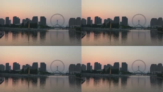 黄昏时分，天津河边的天际线和现代建筑。高清在线视频素材下载