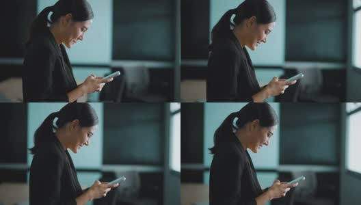 亚洲女商人使用电话高清在线视频素材下载