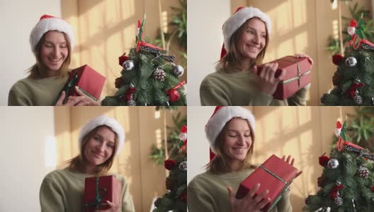 那位年轻女子收到圣诞礼物非常高兴高清在线视频素材下载