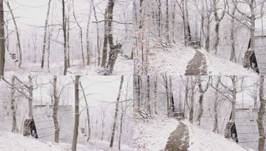 美丽的冬季景观，在雪山上的木屋高清在线视频素材下载
