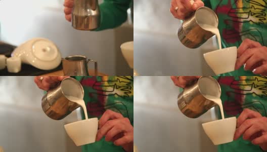 往咖啡师的咖啡里倒牛奶高清在线视频素材下载