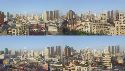 建筑工地鸟瞰图，背景为现代建筑，上海天际线高清在线视频素材下载