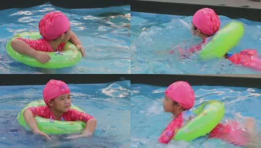 小女孩在游泳池里游泳。高清在线视频素材下载