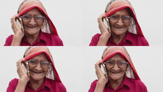 一个老妇人在用手机聊天高清在线视频素材下载