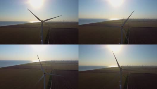 风力发电机在明亮的阳光下发电高清在线视频素材下载