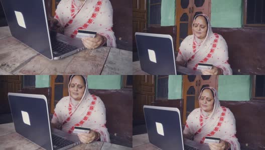 快乐的印度女人在家网购。高清在线视频素材下载