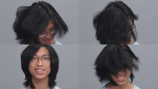 英俊微笑的年轻亚洲人摇他的头发高清在线视频素材下载