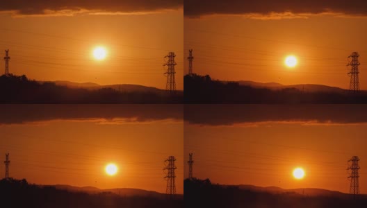 日落时间推移与塔和山的剪影。高清在线视频素材下载