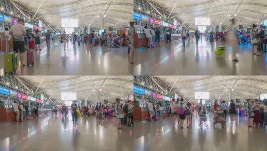 时光流逝:中国西安机场出发大厅的旅客人群高清在线视频素材下载