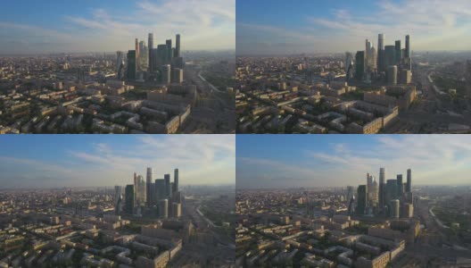 俄罗斯阳光明媚的日落莫斯科现代城市河空中全景4k高清在线视频素材下载