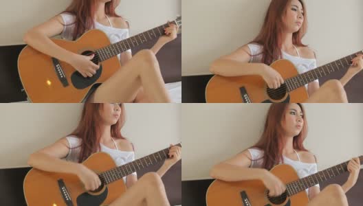 女孩弹吉他高清在线视频素材下载