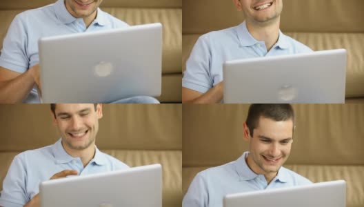 HD:在家里拿着笔记本电脑的男人，笑着，笑着高清在线视频素材下载