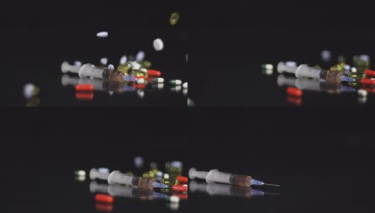 高清慢镜头:药丸掉在注射器上高清在线视频素材下载