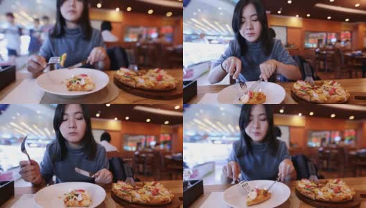吃披萨的女人高清在线视频素材下载