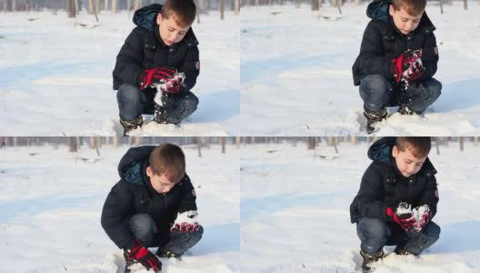 小男孩在雪里玩高清在线视频素材下载