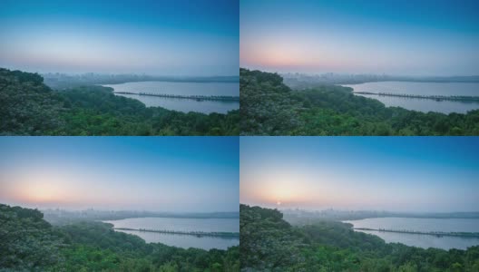 日出时杭州的天空和西湖。时间流逝。高清在线视频素材下载