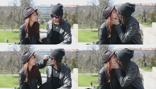 一对相爱的年轻情侣在外面接吻高清在线视频素材下载