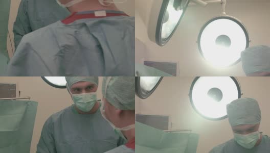 两个外科医生在手术室里高清在线视频素材下载