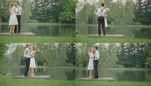 SLO MO新娘和新郎在湖边跳舞高清在线视频素材下载