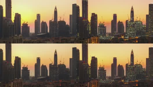 迪拜市中心的天际线上有正在工作的起重机，时间流逝高清在线视频素材下载