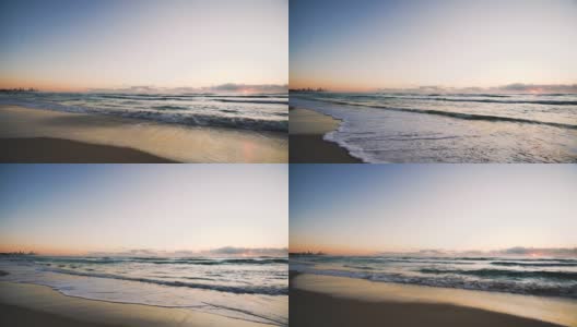 日出在海滩黄金海岸昆士兰澳大利亚美丽的自然景观浪沙云彩海滩高清在线视频素材下载