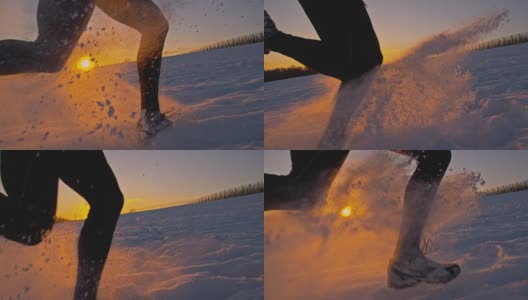 SLO MO慢跑者在夕阳下的雪中跋涉高清在线视频素材下载
