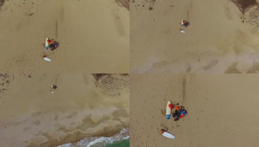 冲浪女孩在沙滩上放松4K高清在线视频素材下载