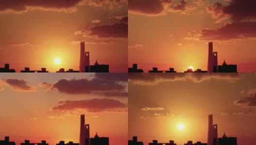 Time lapse footage剪影现代建筑与日落的太阳和云彩，上海地标与美丽的日落傍晚，4k视频。高清在线视频素材下载