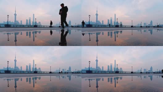 中国，早上在上海外滩跑步或散步的人们的剪影，4k镜头，时间流逝。高清在线视频素材下载