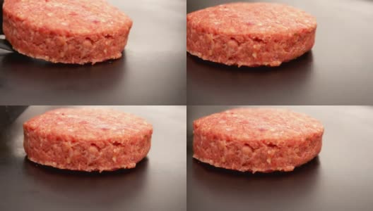汉堡正在石头烤架上烤着高清在线视频素材下载