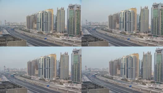 令人惊叹的屋顶视图，围绕迪拜码头和JLT摩天大楼谢赫扎耶德路高清在线视频素材下载