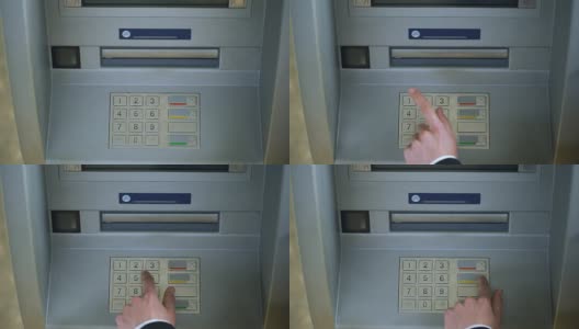 有人在修改ATM键盘上的pin码，在银行账户间转账高清在线视频素材下载